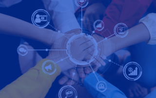 A picture of hands all together in a huddle with different business graphics overlaid. There is a blue filter on the image.