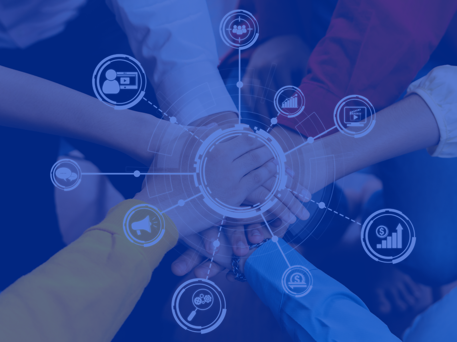 A photo of a group of crew members standing shoulder to shoulder looking at the camera.