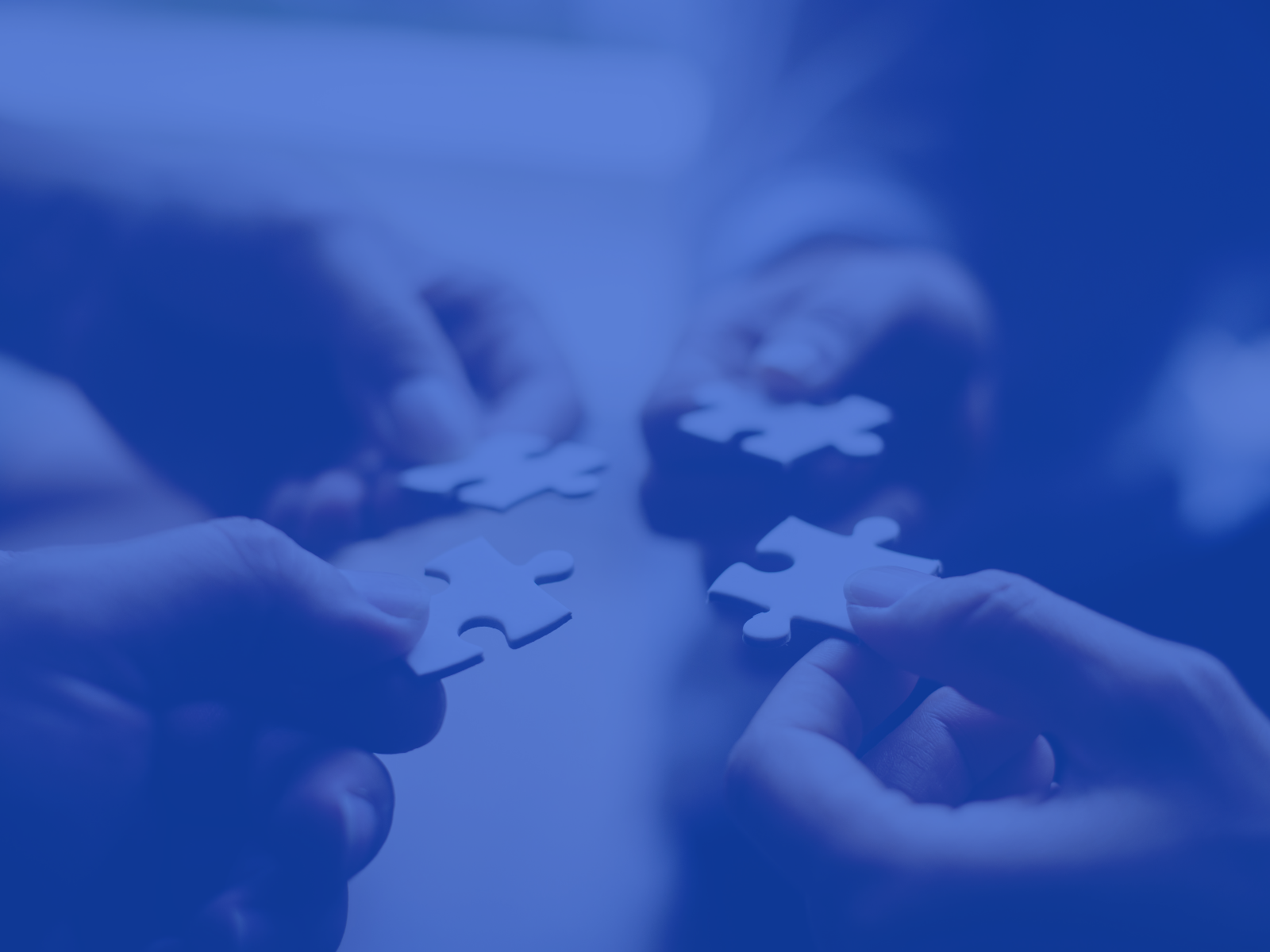 A photo of a group of crew members standing shoulder to shoulder looking at the camera.